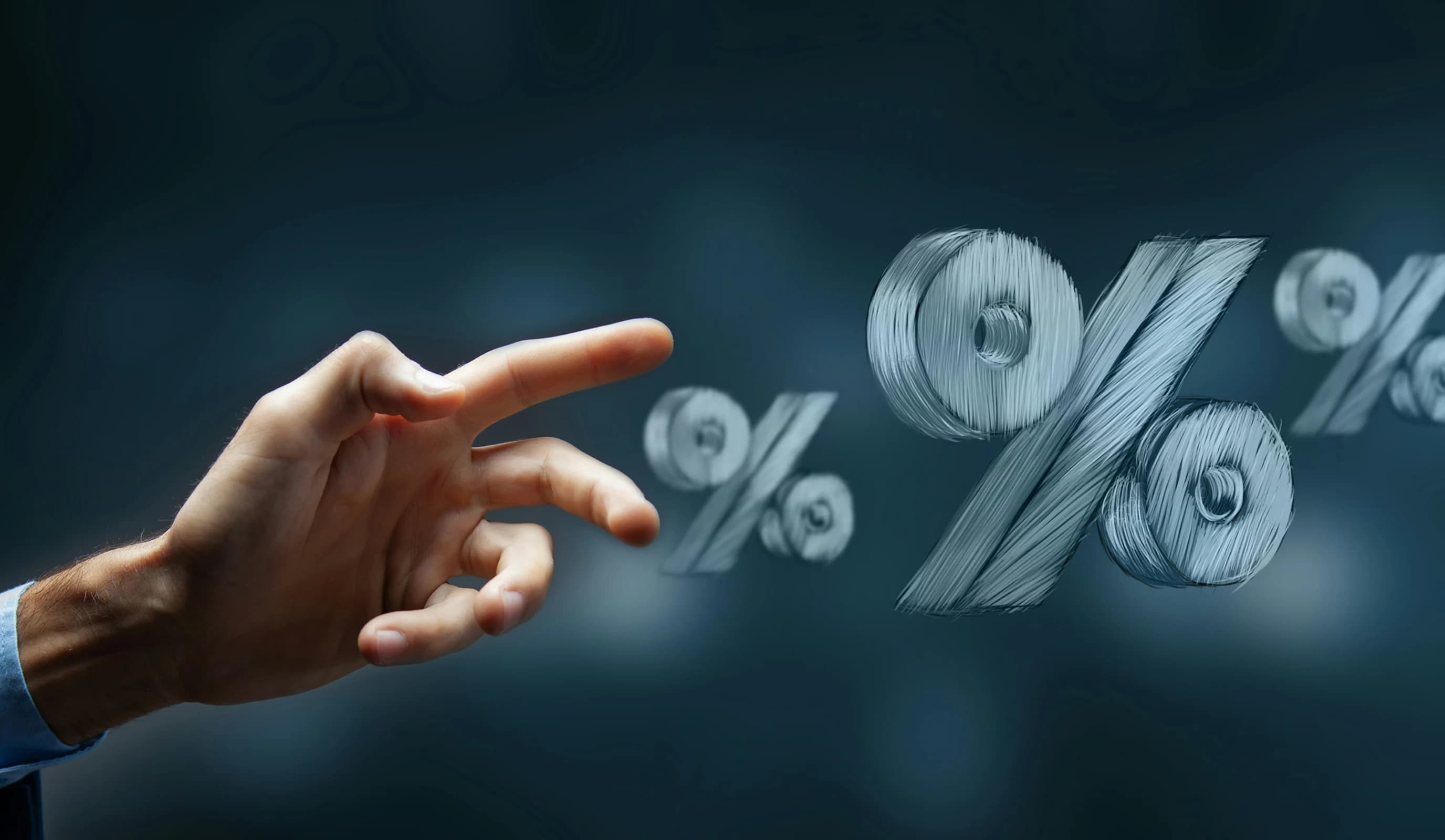 Hand pointing at percentage symbols representing investment return benchmarks and performance targets